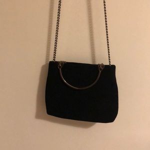 Black purse with chain strap
